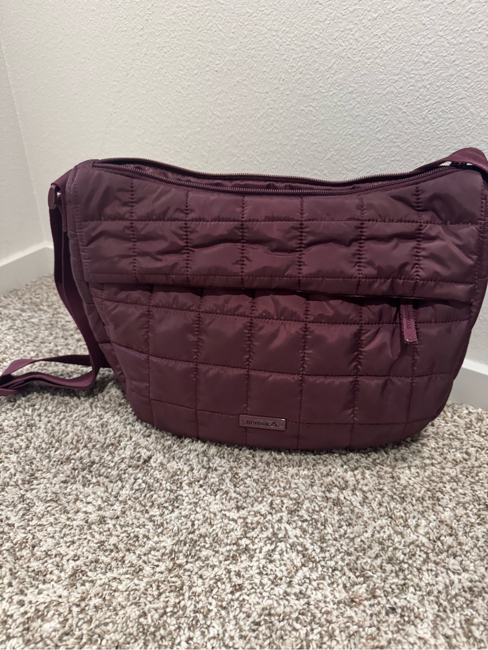Reebok Quilted Crossbody Bag in Plum
